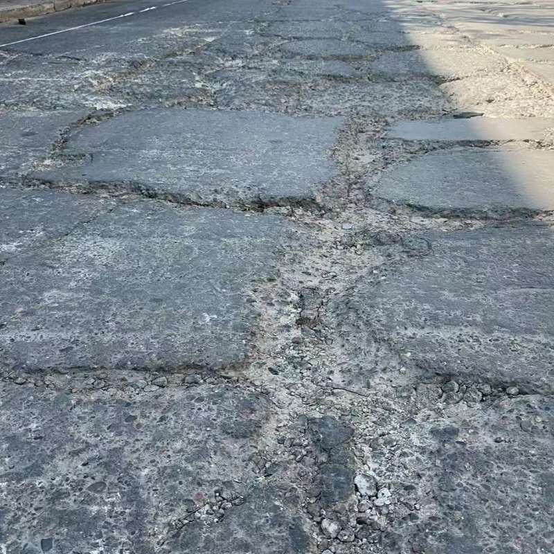 胶南路面起砂露石子修补料